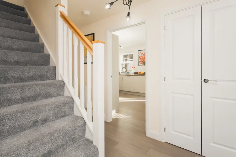 Stairs and hall leading to the kitchen