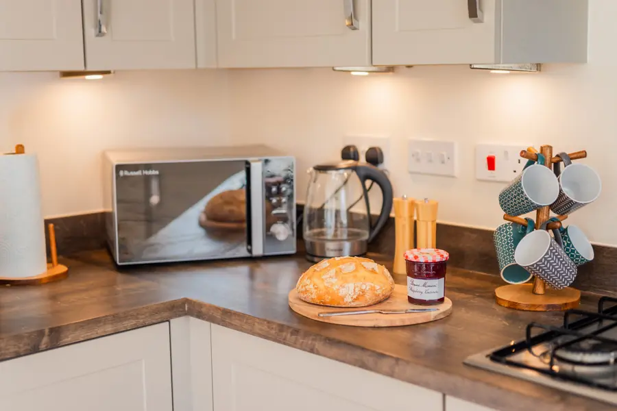 Kitchen worktop with kettle and microwave